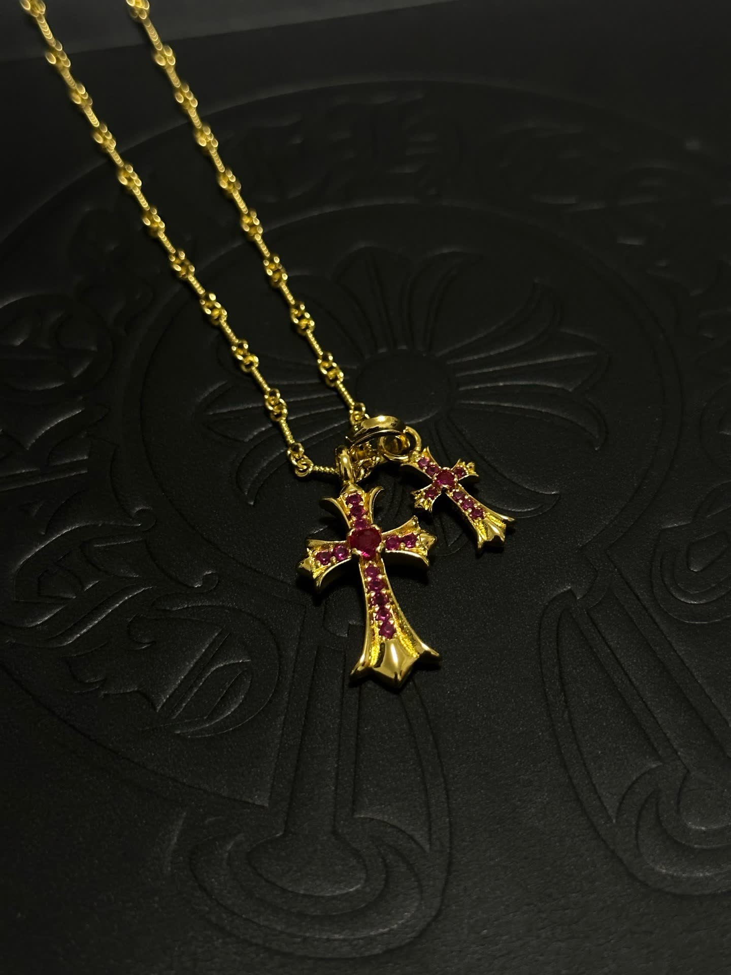 Chrome Hearts Gold Cross Pendant with Ruby Stones